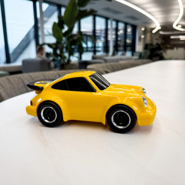 Игрушечная гоночная машинка Baghera Porsche, желтая
