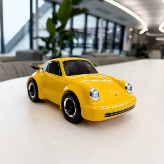 Игрушечная гоночная машинка Baghera Porsche, желтая