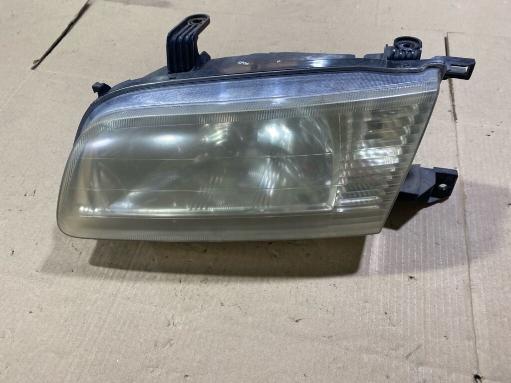 Фара на Nissan Sunny FB15 1602, Левое расположение