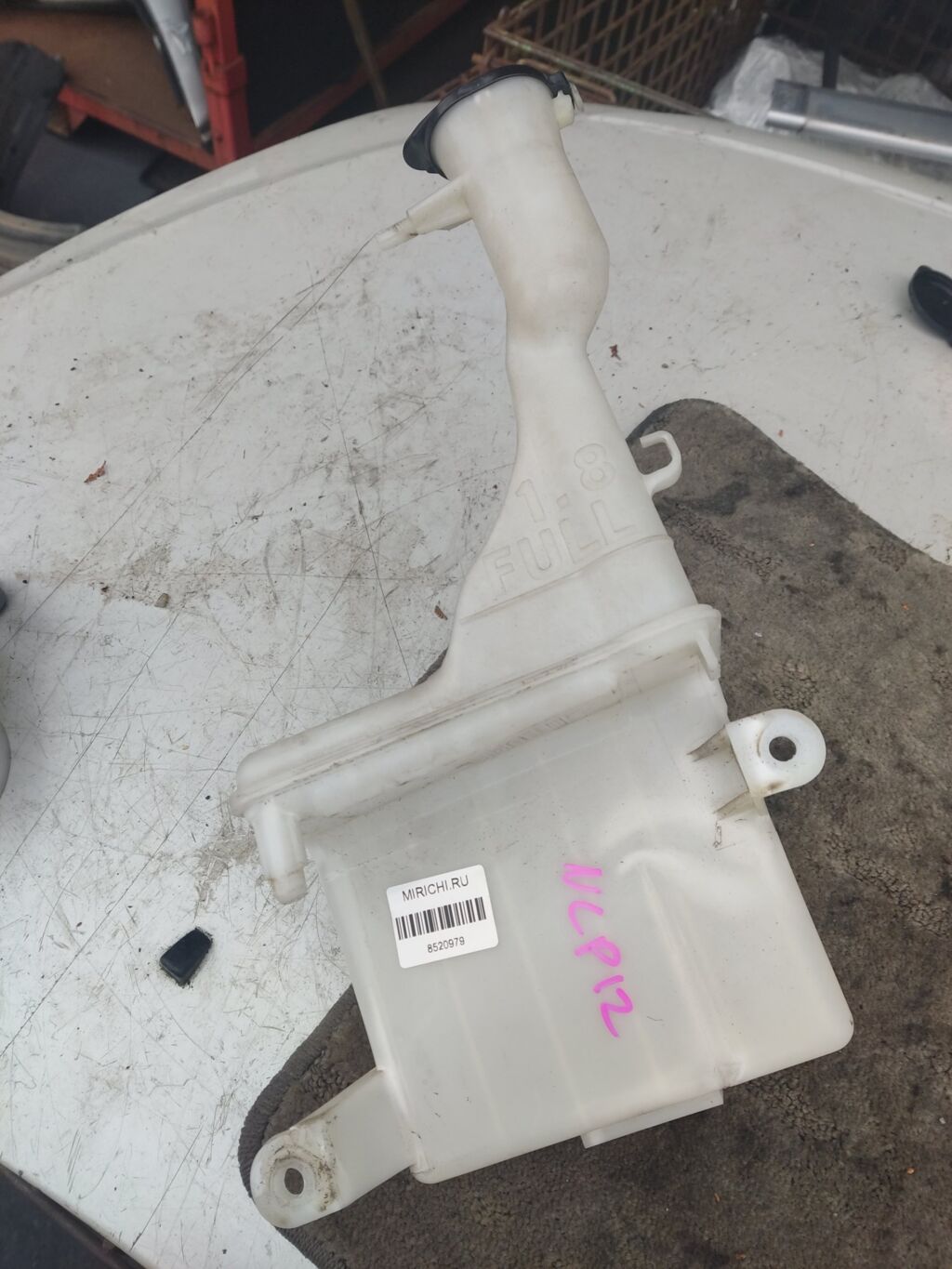 Бачок омывателя на Toyota Platz NCP12