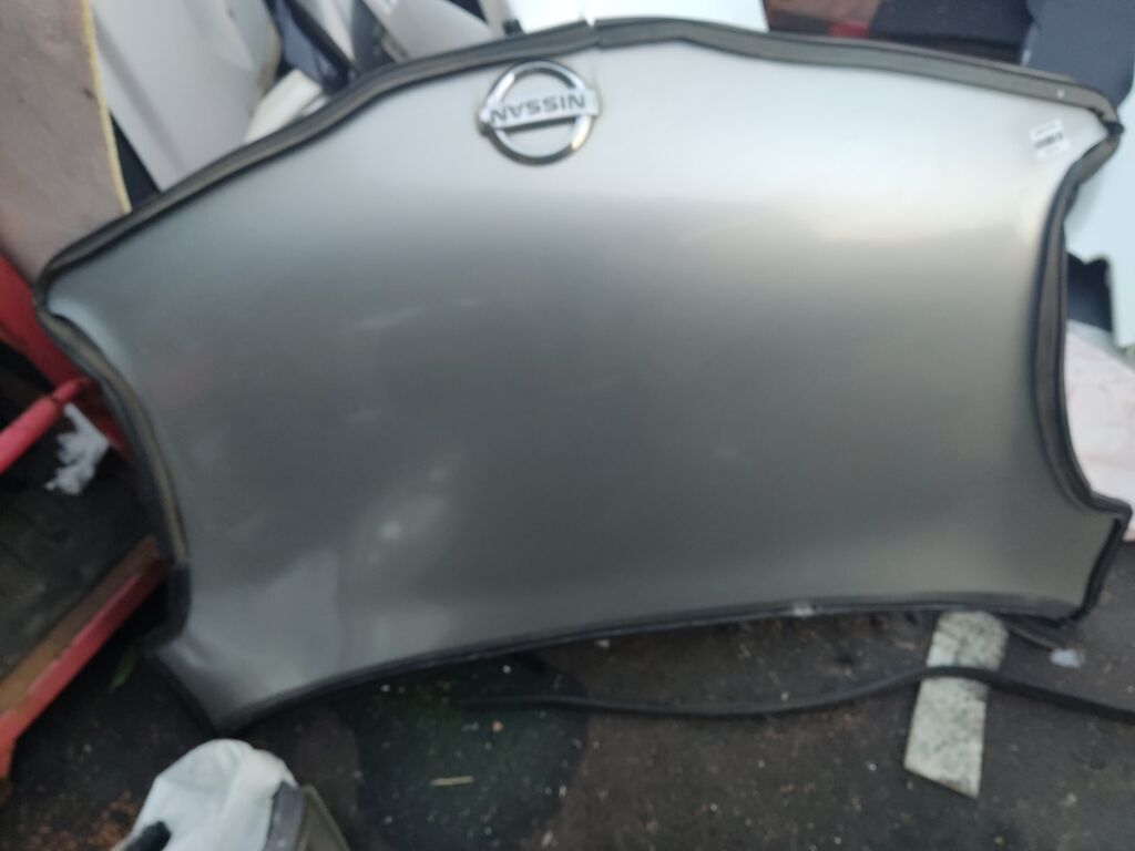 Капот на Nissan March AK12 05032624  12932101  1609280  1609280A1  1610280A1  191008  27 07 03  270703  3328660  6024000  65100AX630  6803001609280P  8120062  974700  99B80  DS0113100  DS0113130  DS20083A  DS20083AV  DT48001500000  DT480150  F5100 AX0MM  F5100AX6MA  GD1110B  GD99B80  NI264011  NNMIC03330  NS99B80  PDS20083A  STDT480150