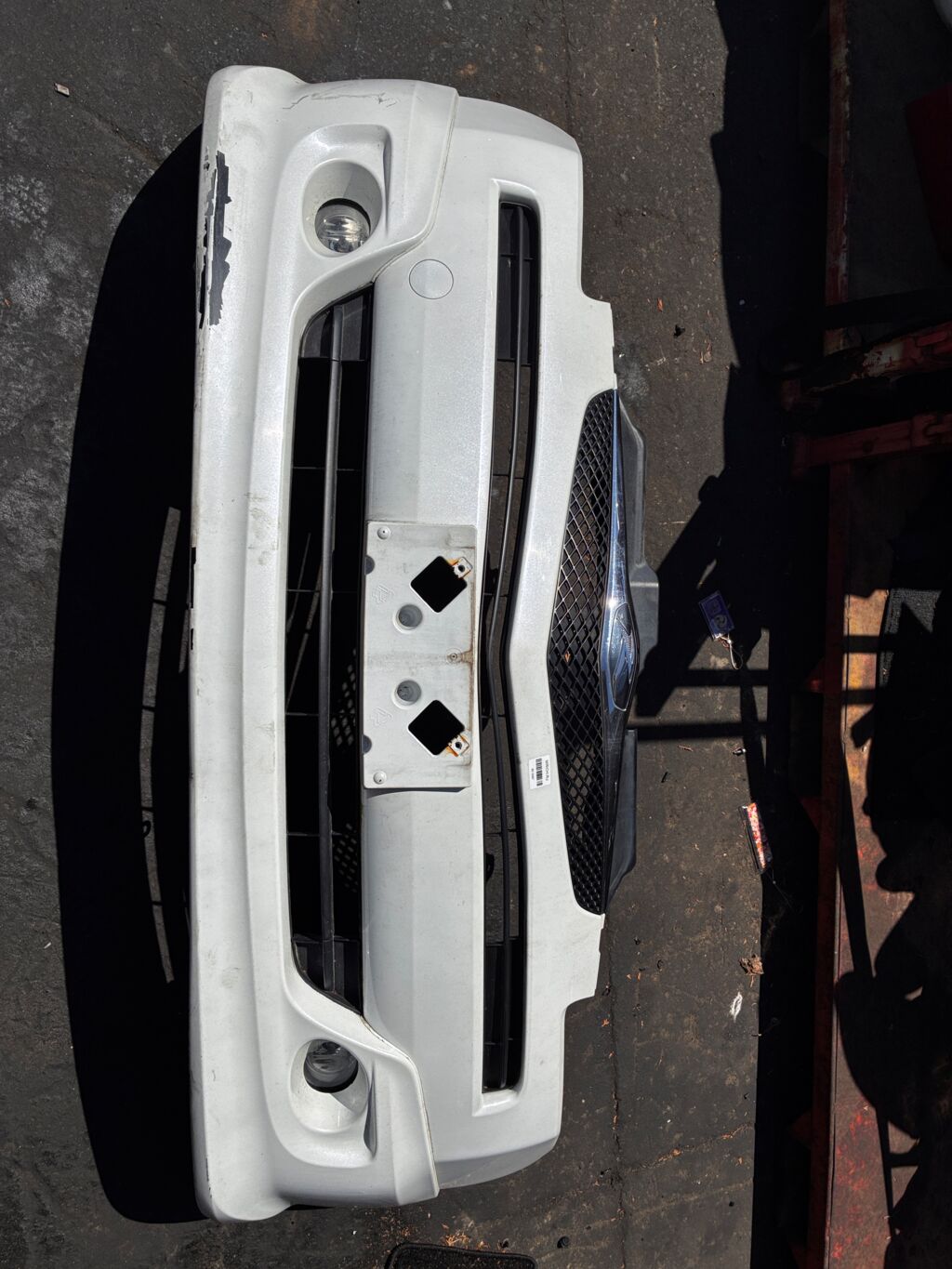 Бампер на Toyota Ractis NCP100 0D-2 52119-52480, Переднее расположение
