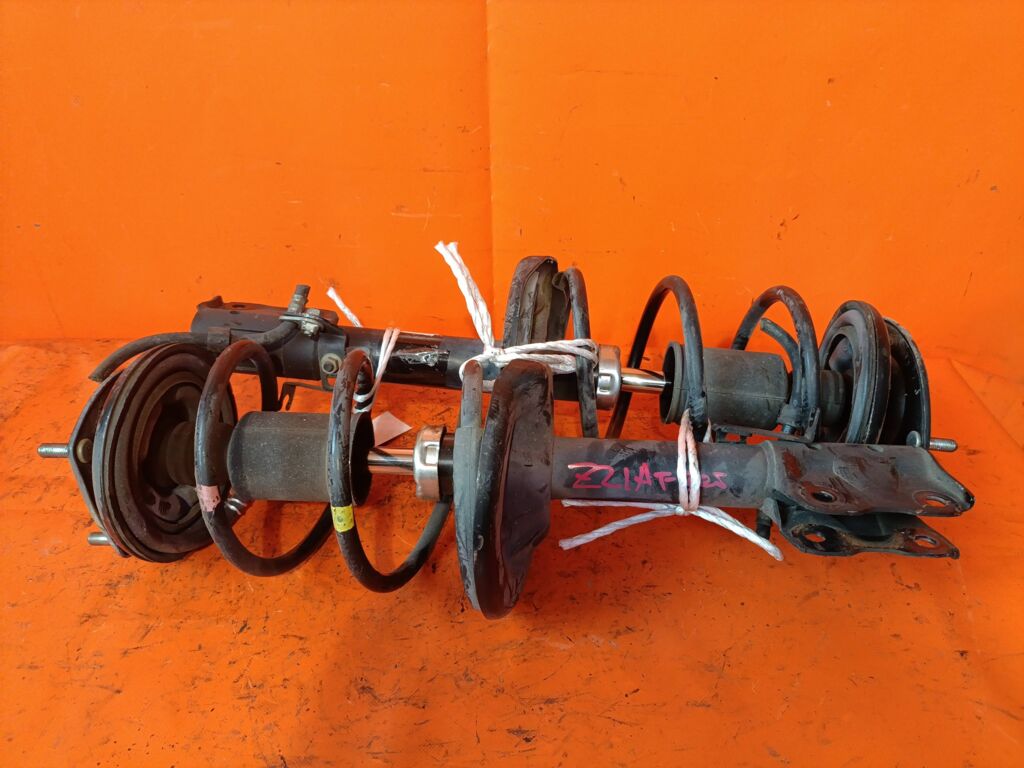 Стойка амортизатора на Mitsubishi Colt Z21A 4A90 333476  4060A198  MR594045  SST0165, Переднее расположение