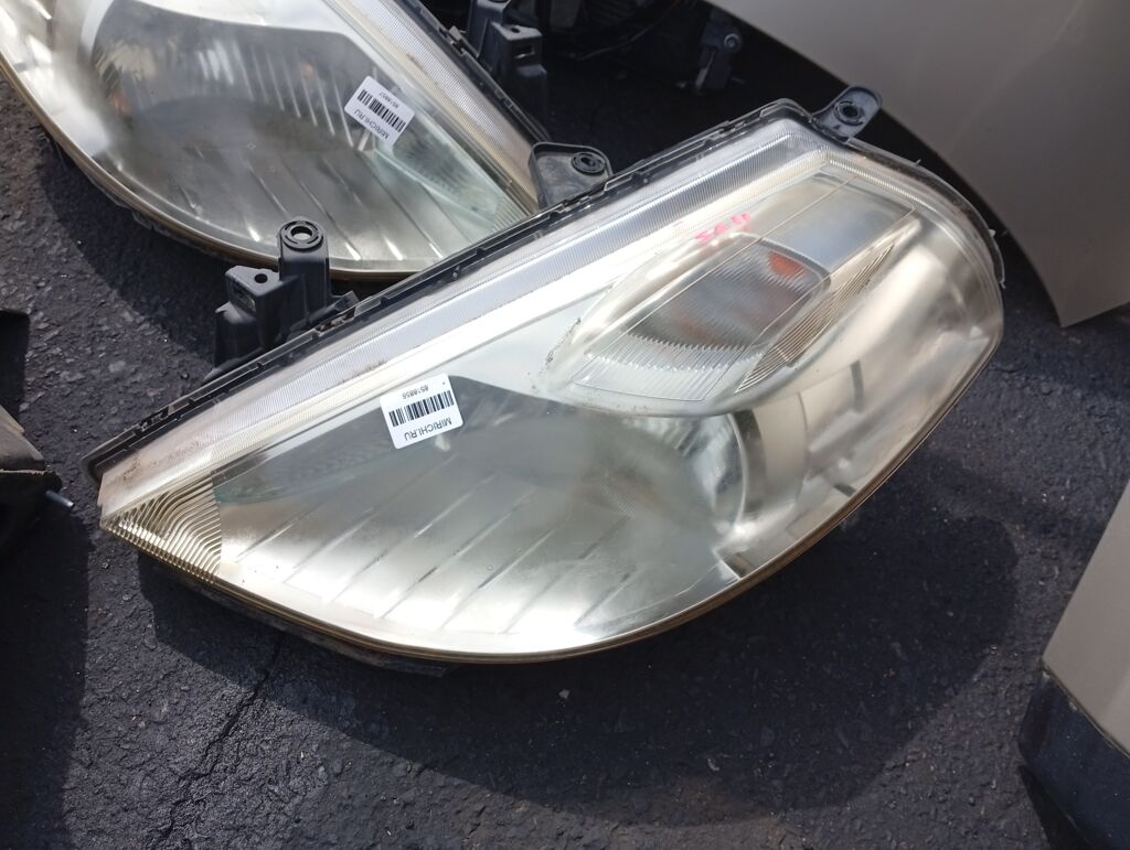 Фара P7779 P7779, на Nissan Tiida Latio SC11 Фото 2