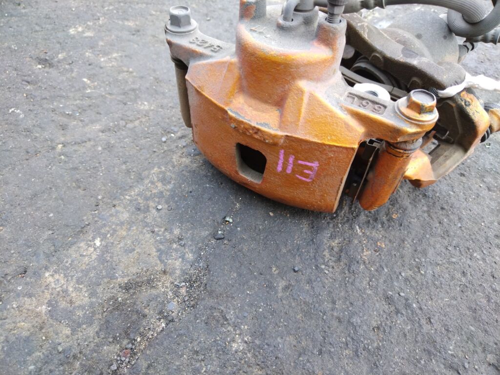 Суппорт на Nissan Note E11 HR15DE, Переднее расположение