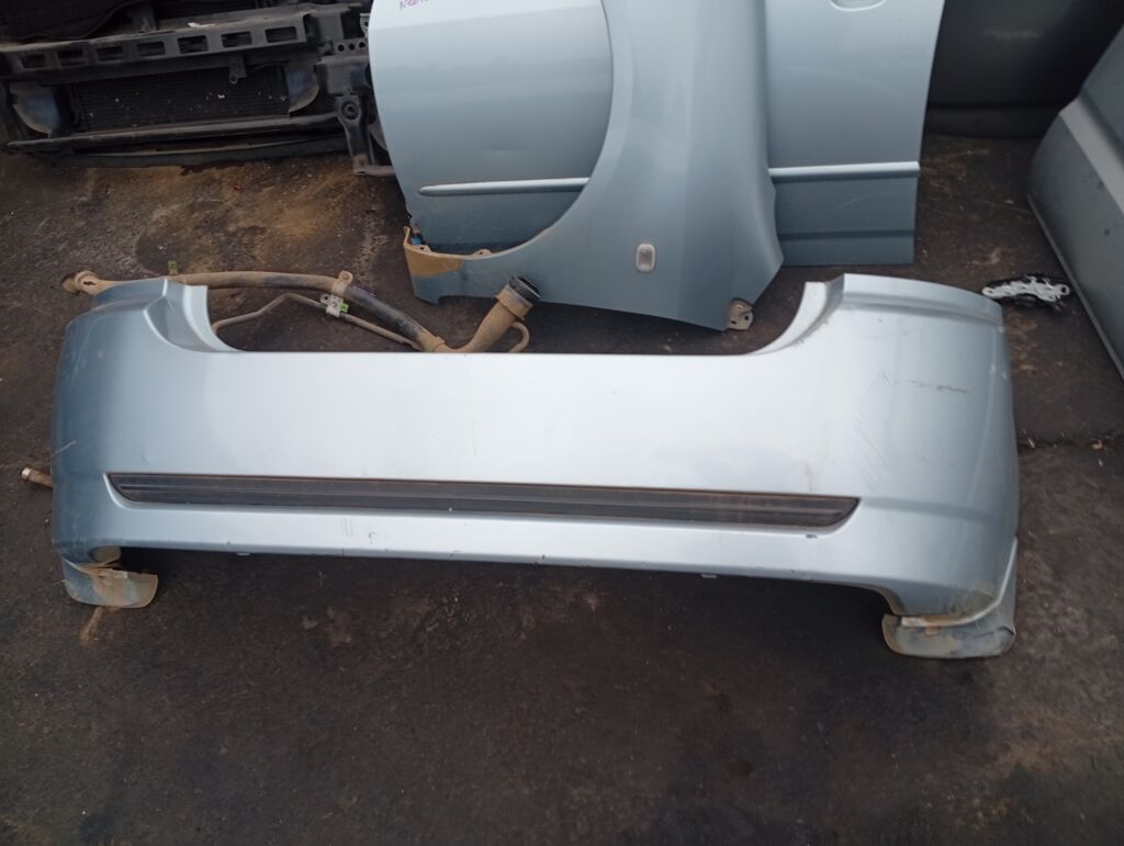 Бампер на Toyota Allex NZE121 52159-13240, Заднее расположение