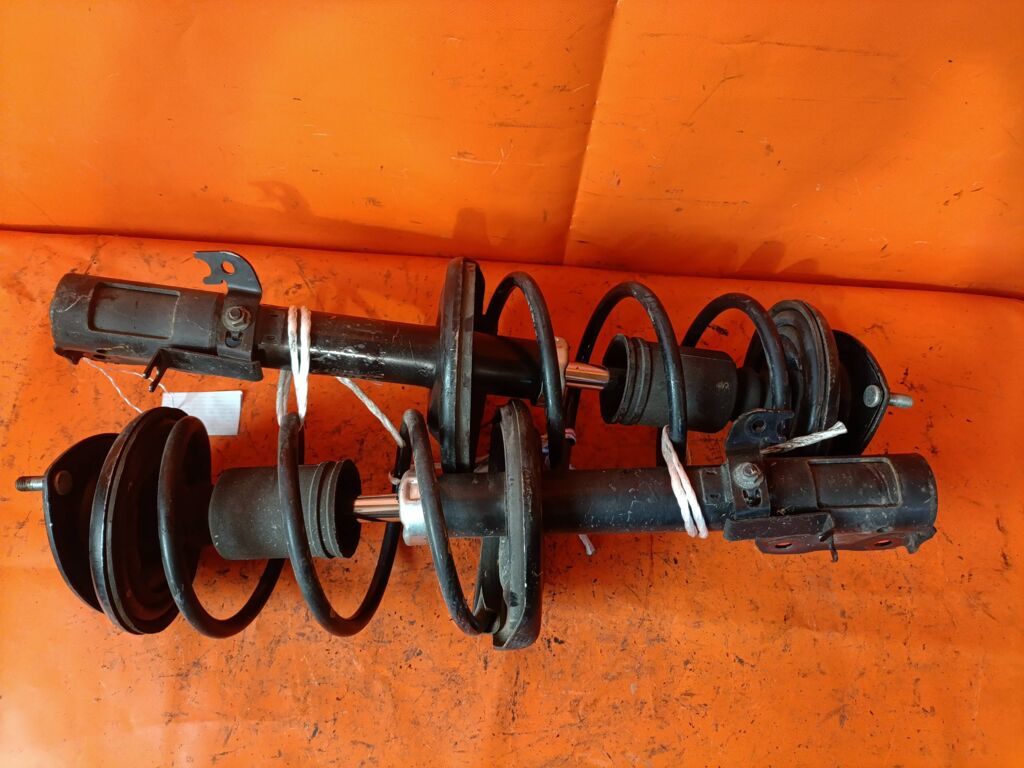 Стойка амортизатора на Mitsubishi Colt Z21A 4A90 333476  4060A198  MR594045  SST0165, Переднее расположение