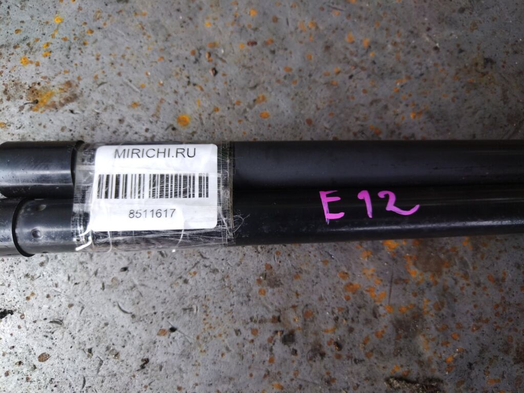 Амортизатор двери на Nissan Note E12