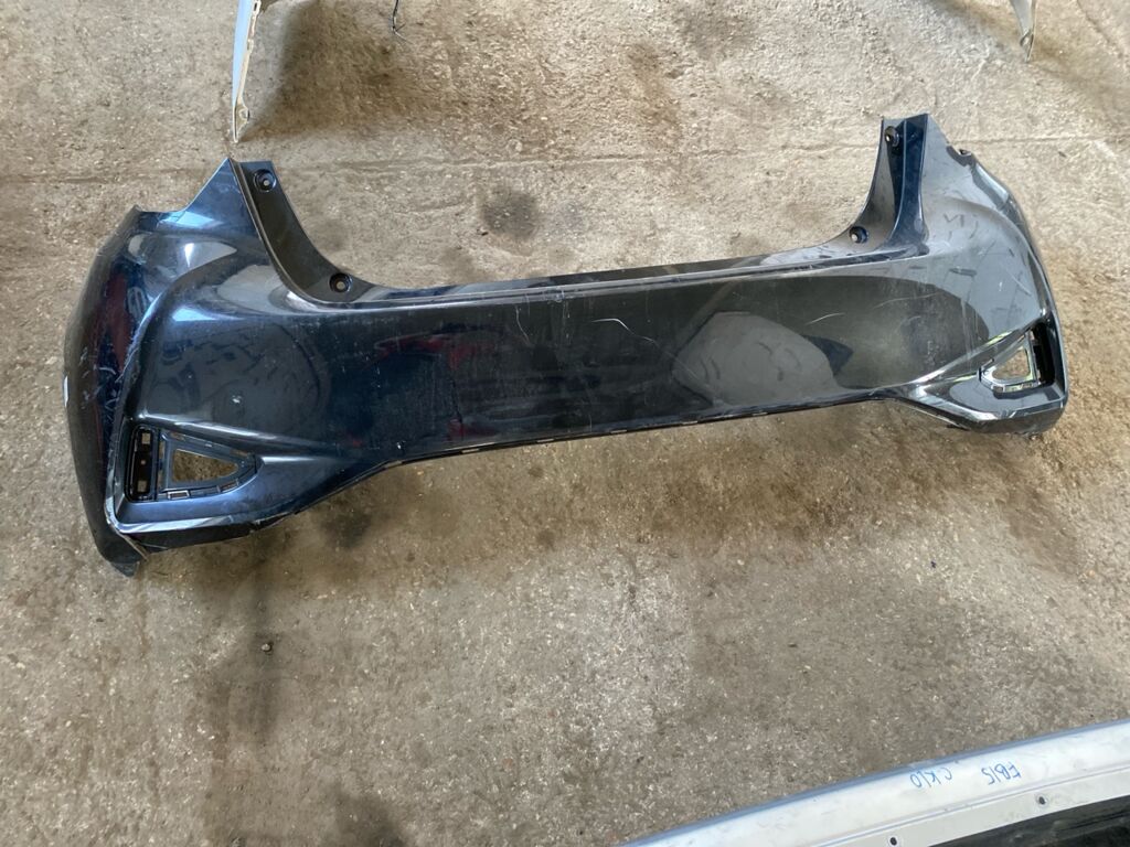 Бампер на Toyota Vitz KSP130 52159-52870, Заднее расположение