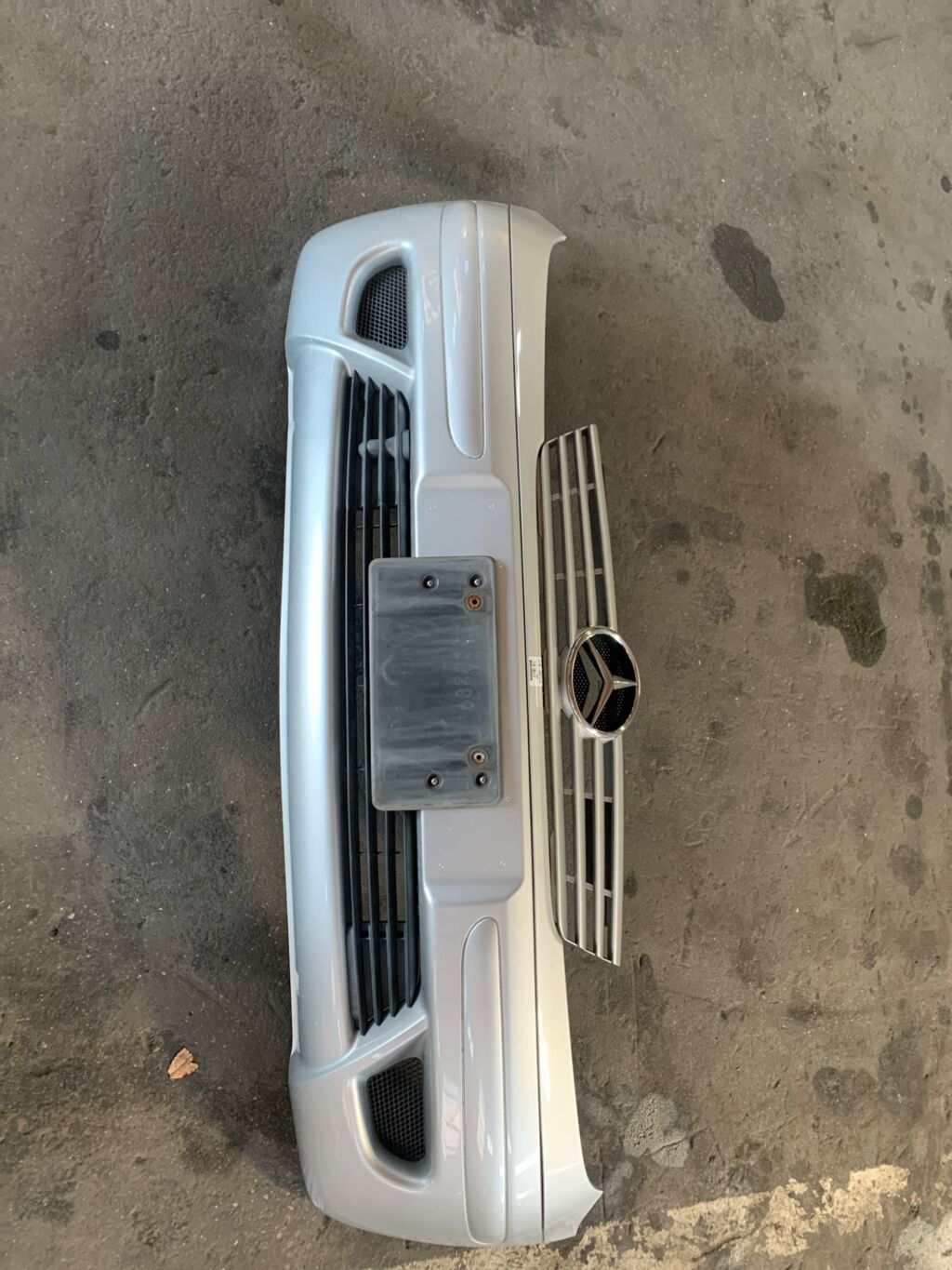 Бампер на Mercedes-Benz Vaneo W414.700 без решетки A4148850025, Переднее расположение