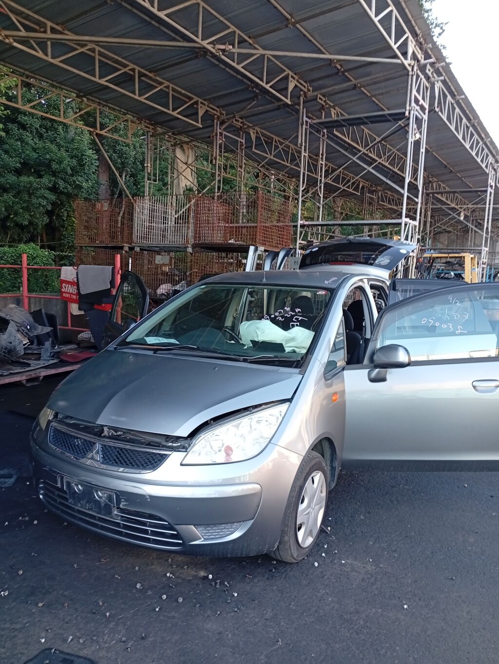 Бампер на Mitsubishi Colt Z22A MN170471, Переднее расположение