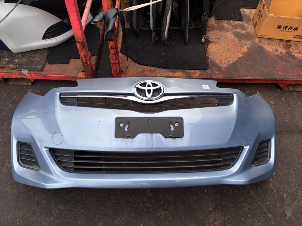 Бампер на Toyota Ractis NSP120 52119-52690, Переднее расположение