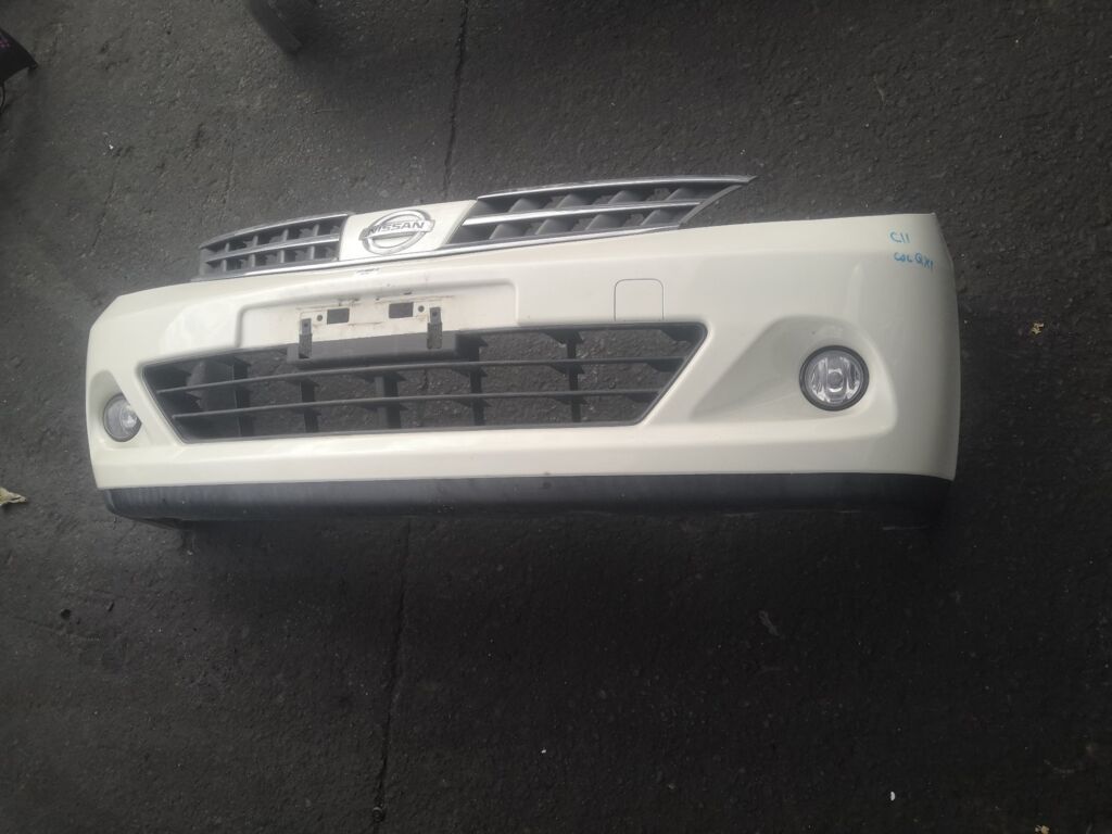 Бампер на Nissan Tiida C11 02B2704 62022-1JY0H  62022-ED025  62022ED025  62022ED540  62022EM00J  DS04213BA  DS04232BA  DS04232BB  DT20100000000  DT20200001000  GD6930  HQ62022EM00J  NS01001DB  NSL10507507  STDTW5000A0  U0505084  UNTEM622294, Переднее расположение