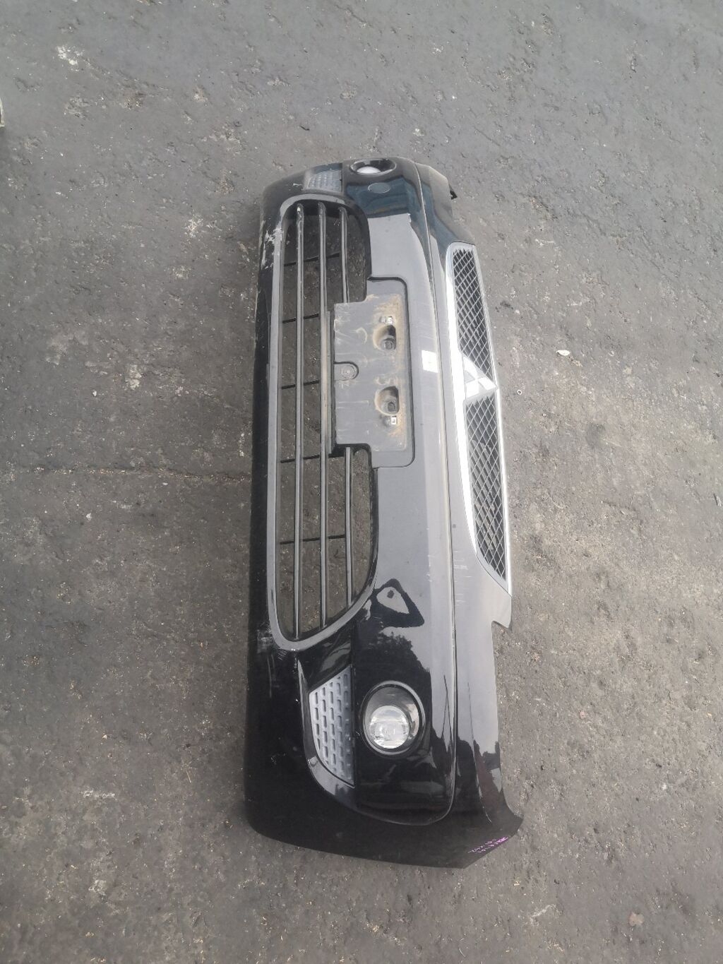 Бампер на Mitsubishi Colt Z21A 021714 MN170471, Переднее расположение