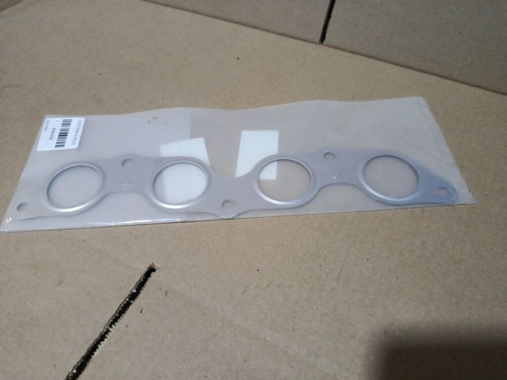 Прокладка под коллектор на Toyota Platz NCP12 1NZ-FE TOYOTA 17173-21020