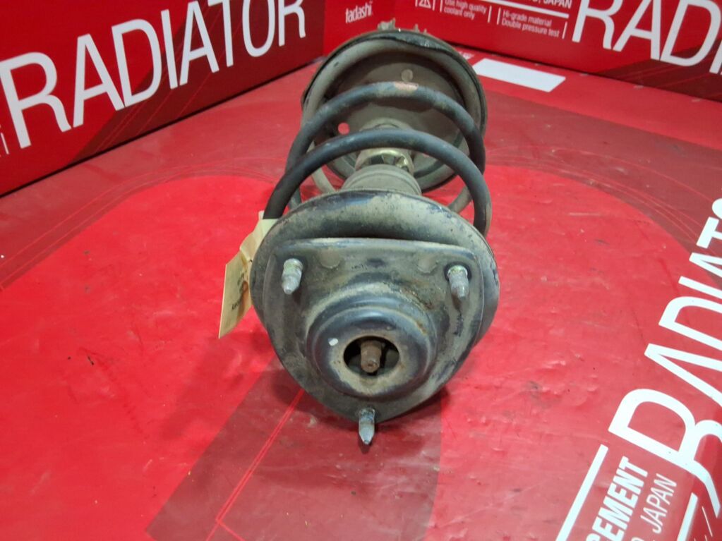 Стойка амортизатора на Mitsubishi Colt Z25A 333476  4060A198  MR594045  SST0165, Переднее Правое расположение