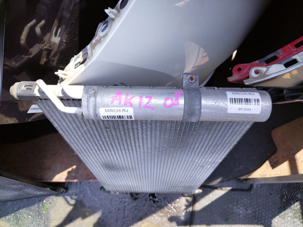 Радиатор кондиционера на Nissan March AK12 CR12DE