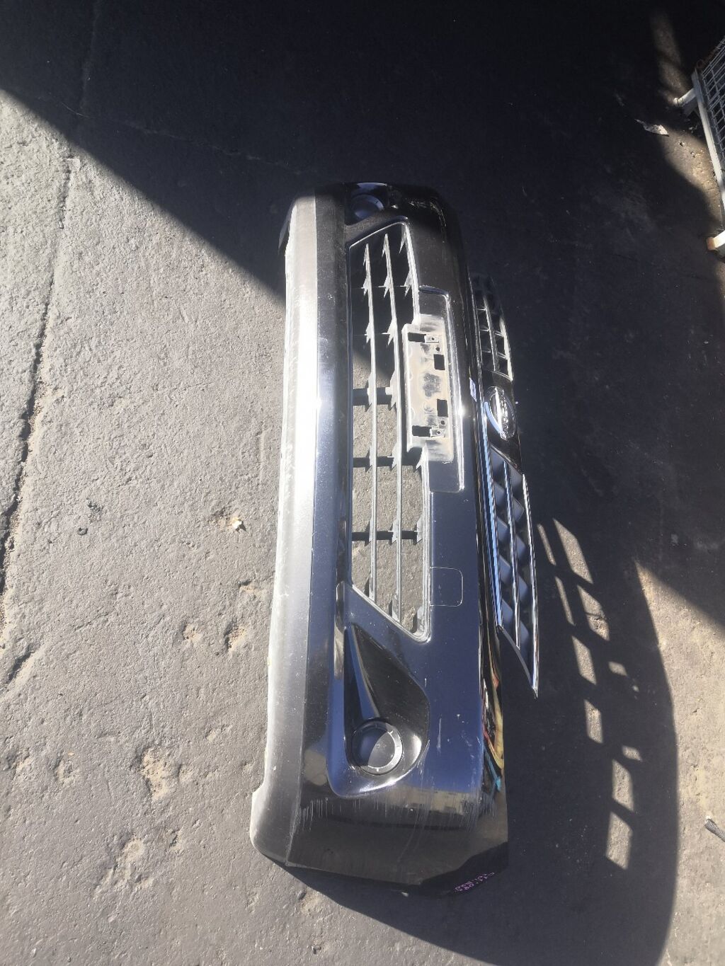 Бампер на Nissan Tiida C11 62022-ED025  62022ED025  62022ED540  62022EM00J  DS04213BA  DS04232BA  DS04232BB  DT20100000000  DT20200001000  GD6930  HQ62022EM00J  NS01001DB  NSL10507507  STDTW5000A0  U0505084  UNTEM622294, Переднее расположение