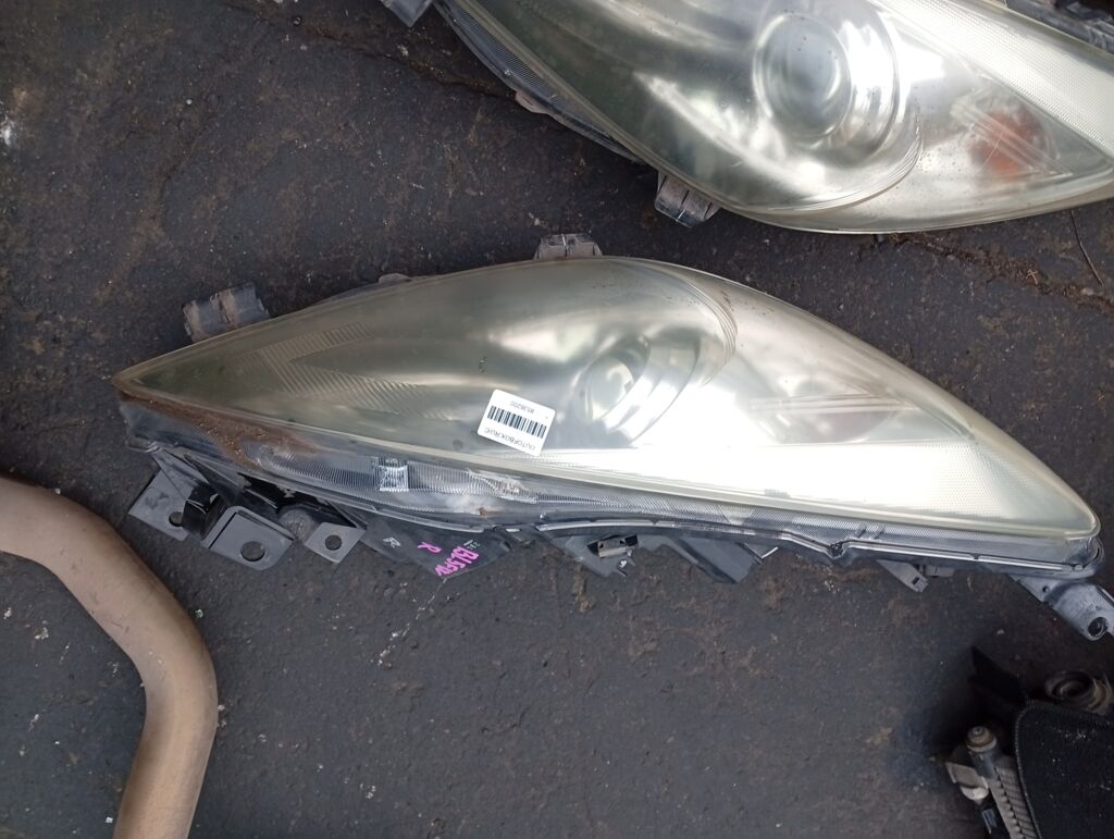 Фара на Mazda Axela BL5FW 100-41396, Правое расположение