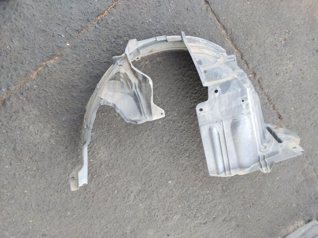 Подкрылок на Nissan March AK12 CR12DE 63843-CT00A, Переднее Левое расположение