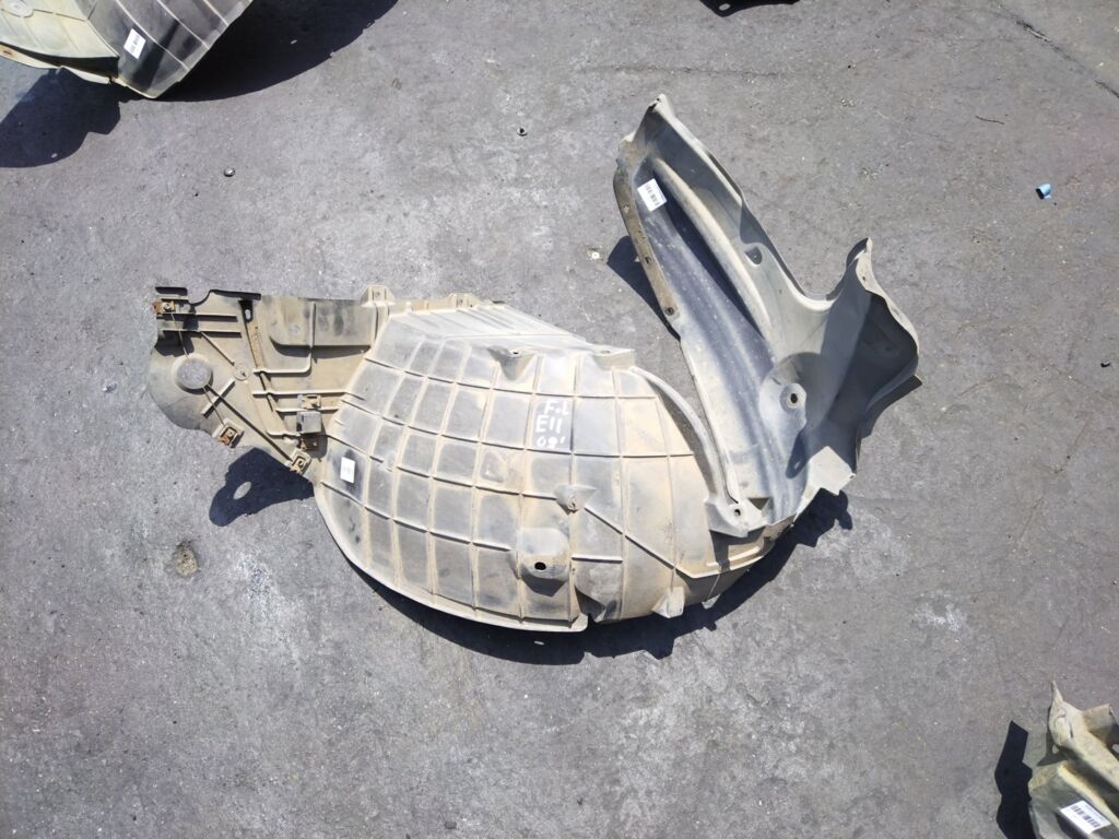 Подкрылок на Nissan Note E11 HR15DE 63843-1U600  212629  2711FL-1B  2711FL1  2711FL1T  63841-9U20A  63841-9U20B  63843-9U000  915.NS11115L  974591  DS11174AL  IK-1217  ST-DTE1-016L-2, Переднее Левое расположение