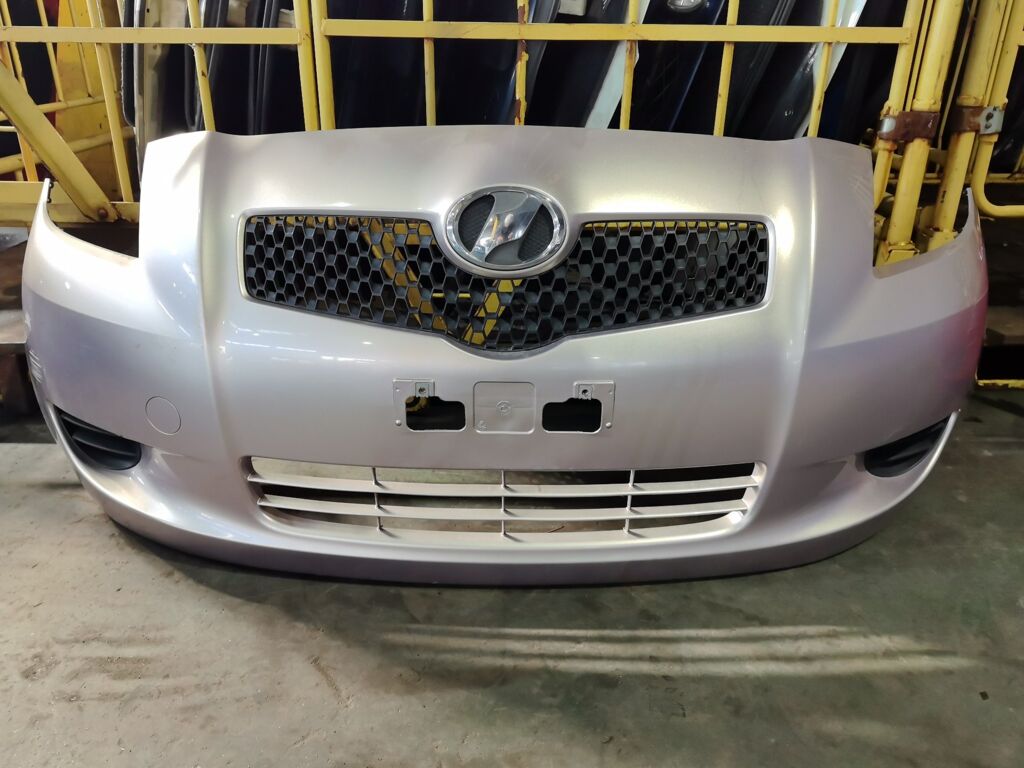 Бампер на Toyota Vitz NCP95 52119-52410, Переднее расположение