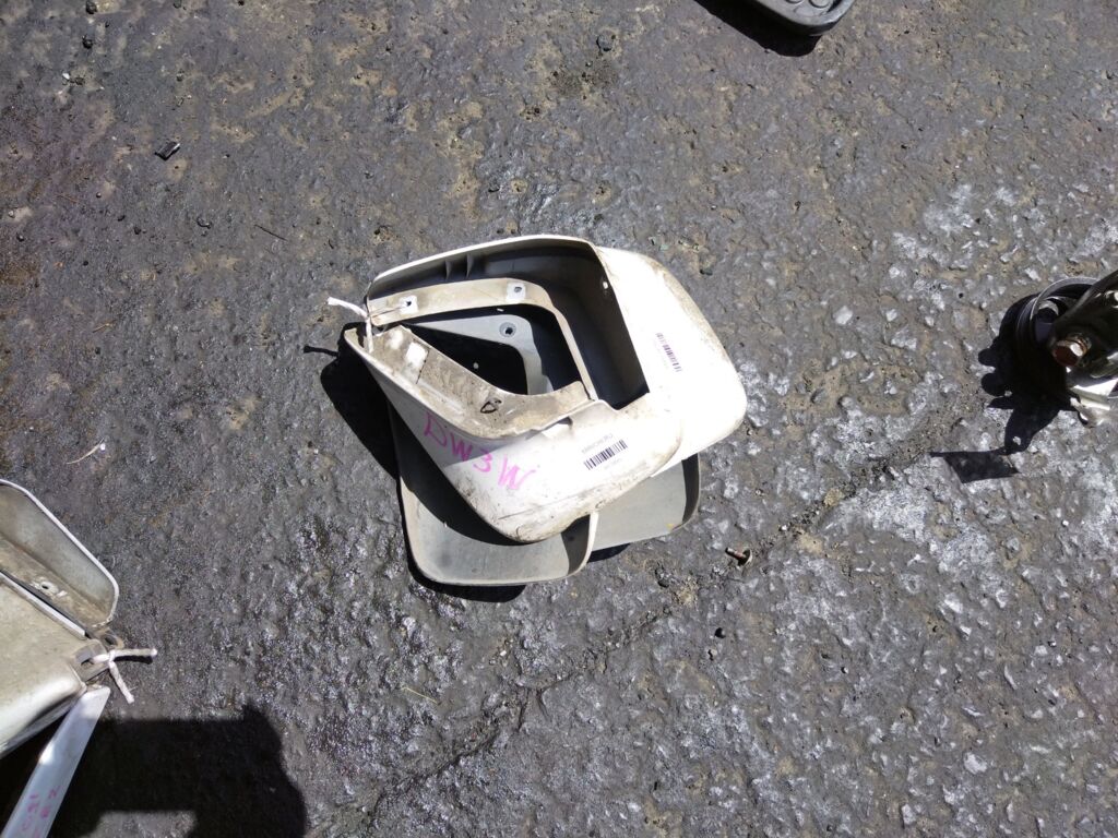 Брызговик на Mazda Demio DW3W Фото 2