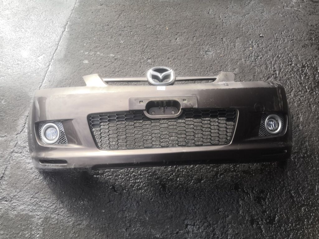 Бампер на Mazda Demio DY3W 114-61009, Переднее расположение