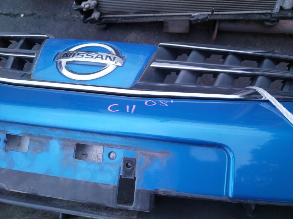 Бампер на Nissan Tiida C11 62022-ED025  62022ED025  62022ED540  62022EM00J  DS04213BA  DS04232BA  DS04232BB  DT20100000000  DT20200001000  GD6930  HQ62022EM00J  NS01001DB  NSL10507507  STDTW5000A0  U0505084  UNTEM622294, Переднее расположение