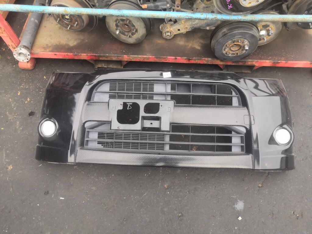 Бампер на Daihatsu Move LA100S P9924, Переднее расположение