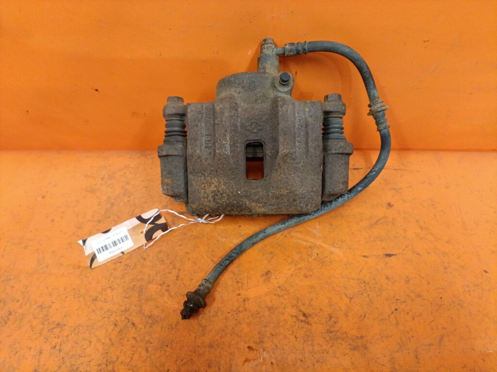 Суппорт на Nissan Atlas R8F23 QD32 41001-21T01, Переднее Правое расположение