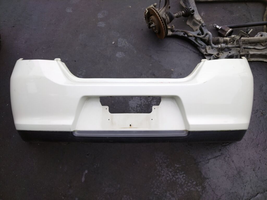 Бампер на Nissan Tiida C11 85022-1JY0H, Заднее расположение