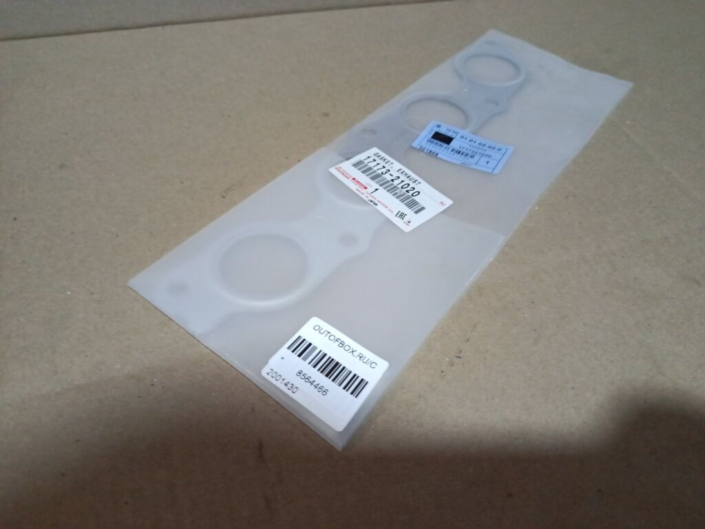 Прокладка под коллектор TOYOTA 17173-21020 на Toyota Platz NCP12 1NZ-FE Фото 3