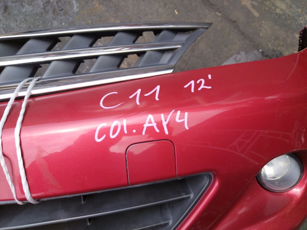 Бампер на Nissan Tiida C11 03B2704 62022-1JY0H  62022-ED025  62022ED025  62022ED540  62022EM00J  DS04213BA  DS04232BA  DS04232BB  DT20100000000  DT20200001000  GD6930  HQ62022EM00J  NS01001DB  NSL10507507  STDTW5000A0  U0505084  UNTEM622294, Переднее расположение