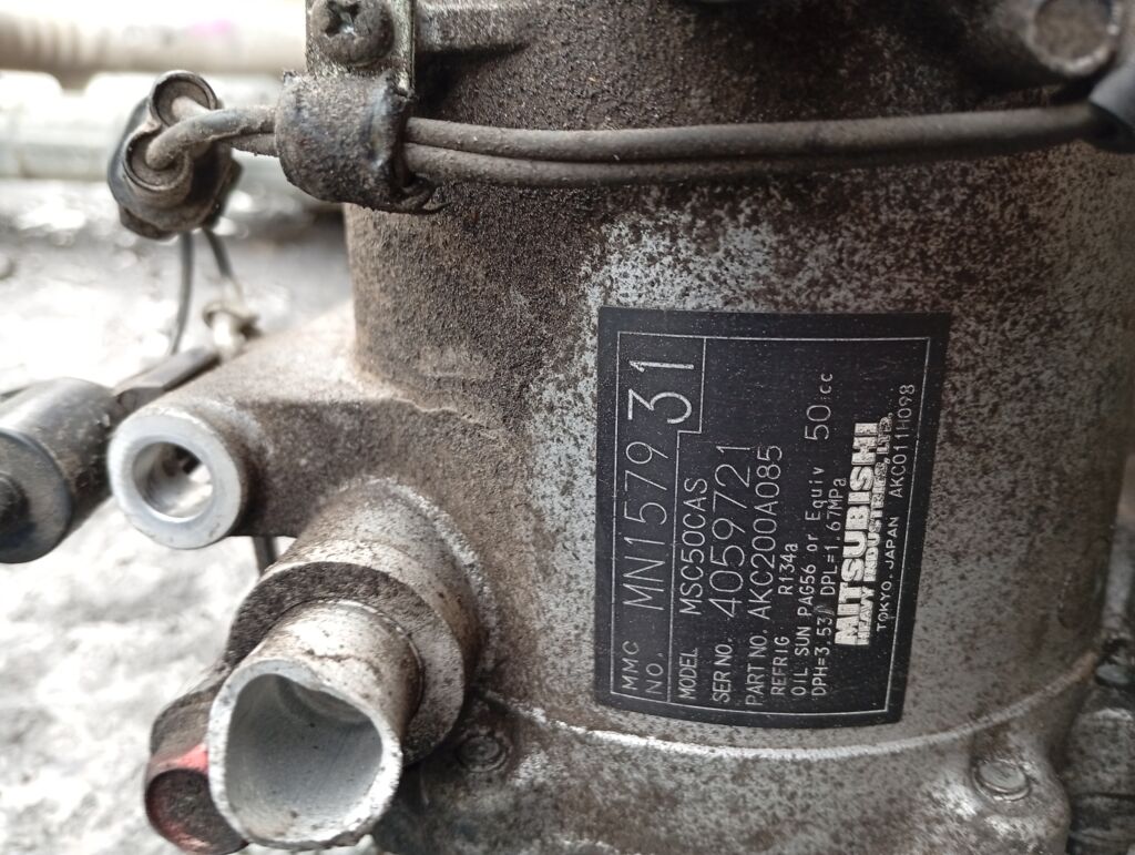 Компрессор кондиционера на Mitsubishi I HA1W 3B20 MN157931