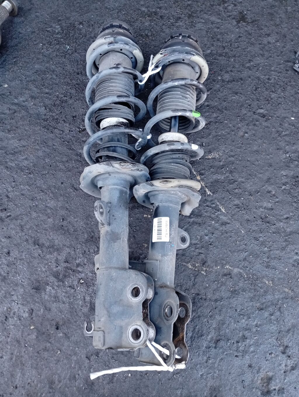 Стойка амортизатора на Nissan Note E12 HR12DDR, Переднее расположение