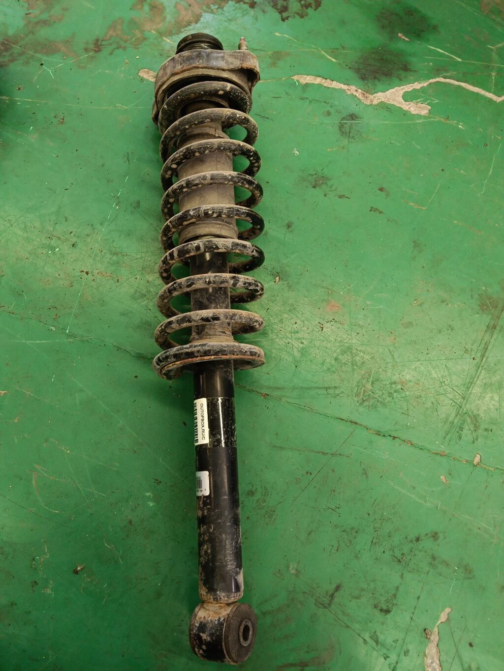 Стойка амортизатора на Mitsubishi Lancer CK1A DA4G18 19-063386  230 003  30-A21-A  341140  441085  CR-049-9745  CR-049R-CJ1A  CR8994  MB809270  MB809271  MB809272  MB871321  MB871322  MB910844  MB911185  MB911186  MB914897  MR197611  MR244447  MR244448  MR403040  MR455762  PW531064  Q2957  SJ-049-9745  SJ-049R-CJ1A  ST-049-9745  ST-049R-CJ1A  U2957, Заднее расположение