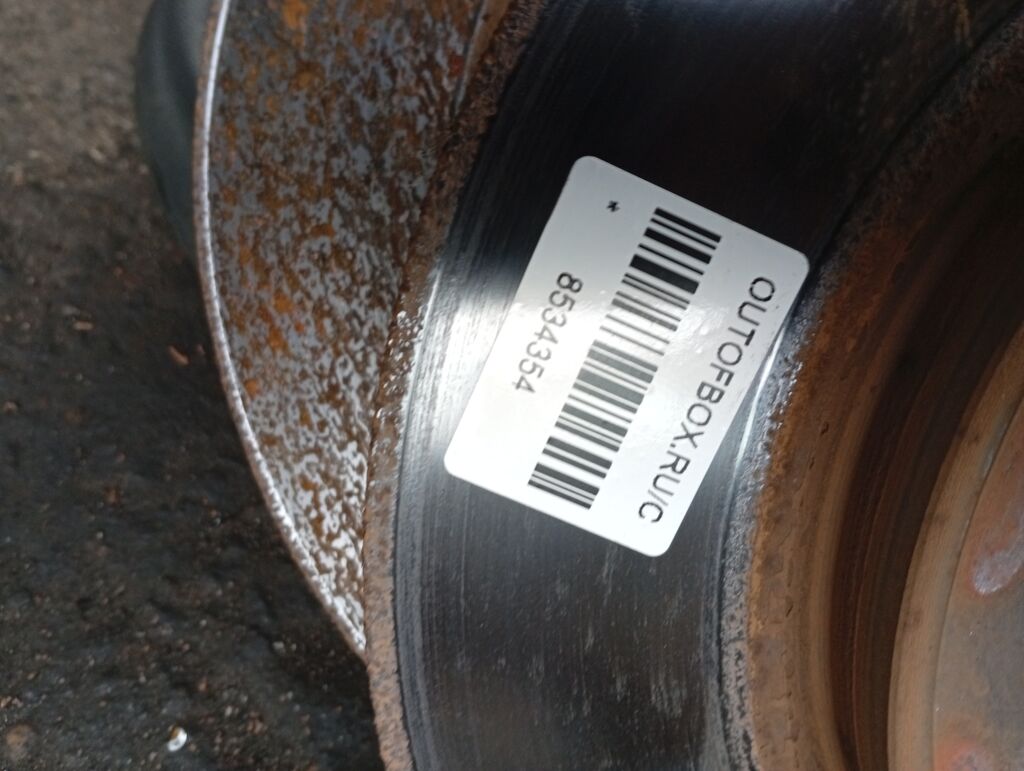 Тормозной диск 40206-CY00A на Nissan Serena C25 MR20DE Фото 2