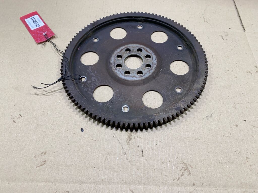 Маховик 32101-12090, 32101-12091 на Toyota Vista ZZV50 1ZZ-FE Фото 2