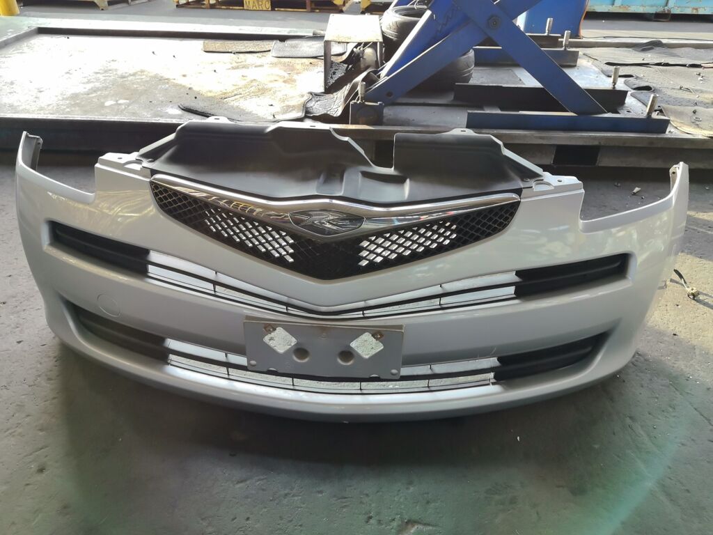 Бампер на Toyota Ractis SCP100 52119-52480, Переднее расположение