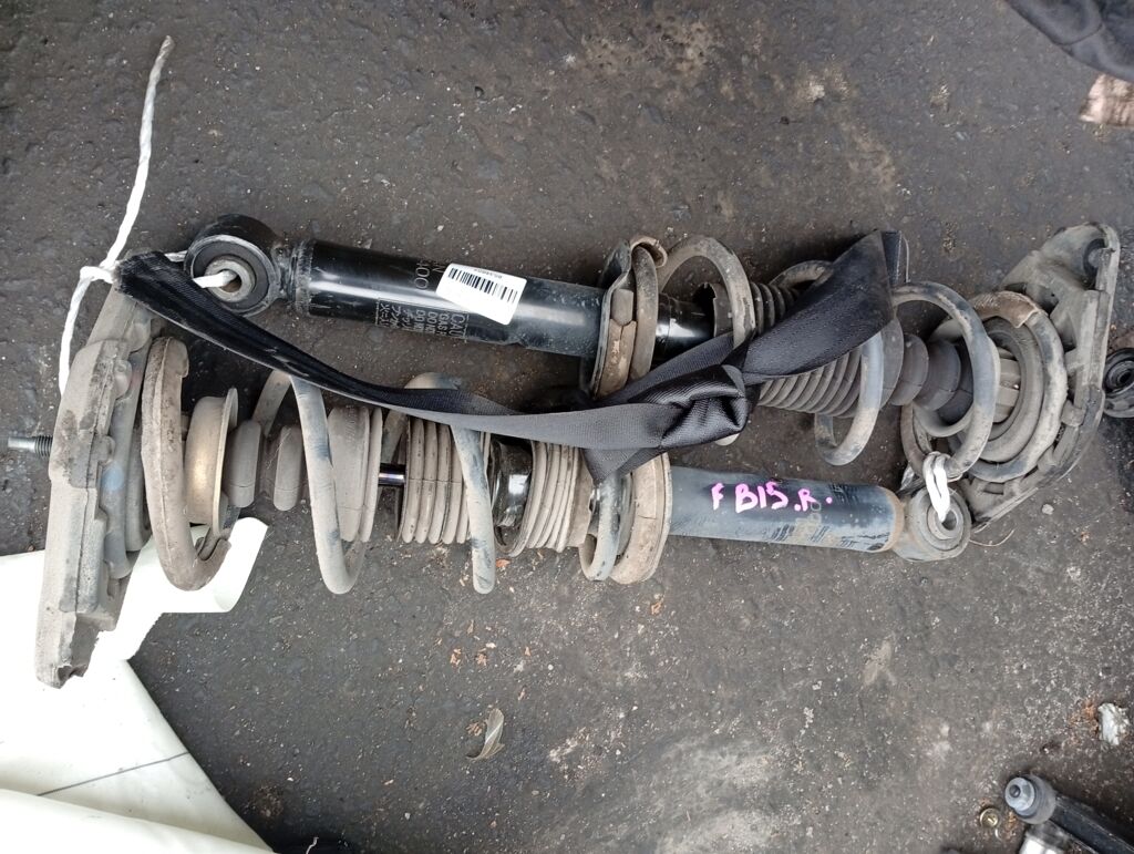 Стойка амортизатора на Nissan Sunny FB15 QG15DE Фото 2