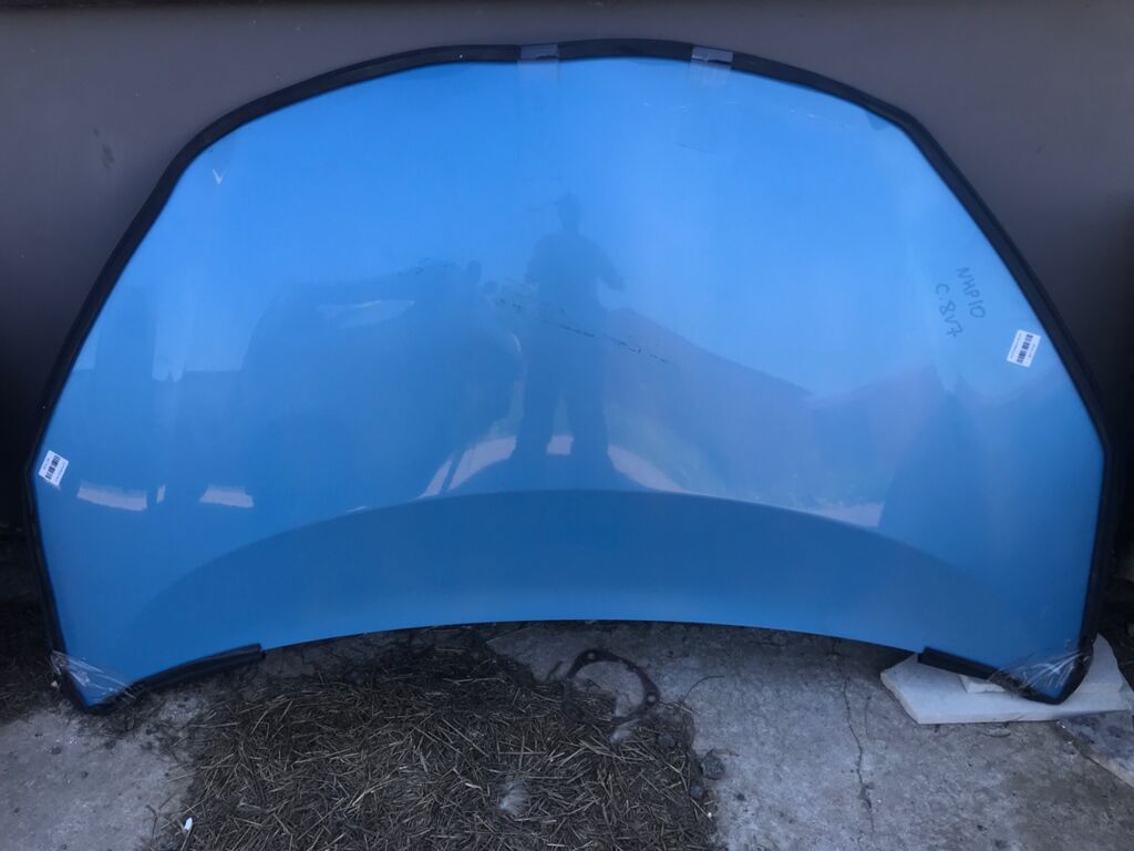 Капот на Toyota Aqua NHP10