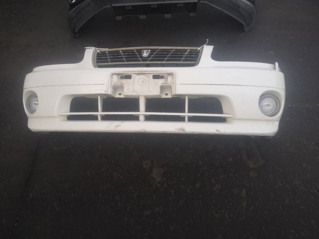 Бампер на Nissan Liberty PM12 2178 62022-WF100, Переднее расположение